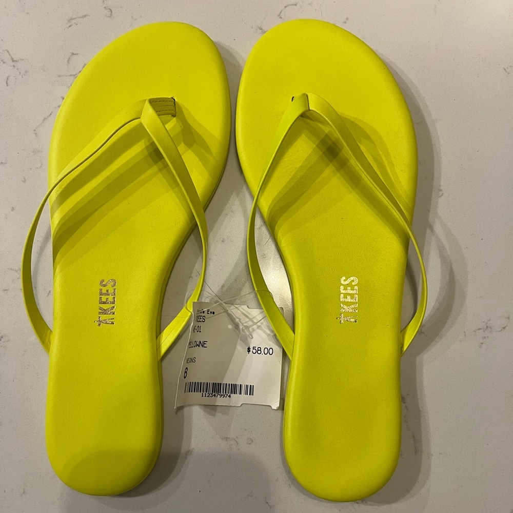 Super cute TKEES flip flops! Soft leather and vibrant yellow color w/ dust bag.